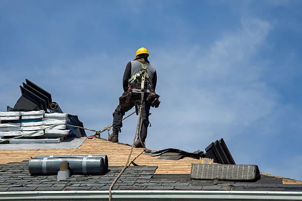 Professional Storm Damage Roof Repair technician working in Angola, IN
